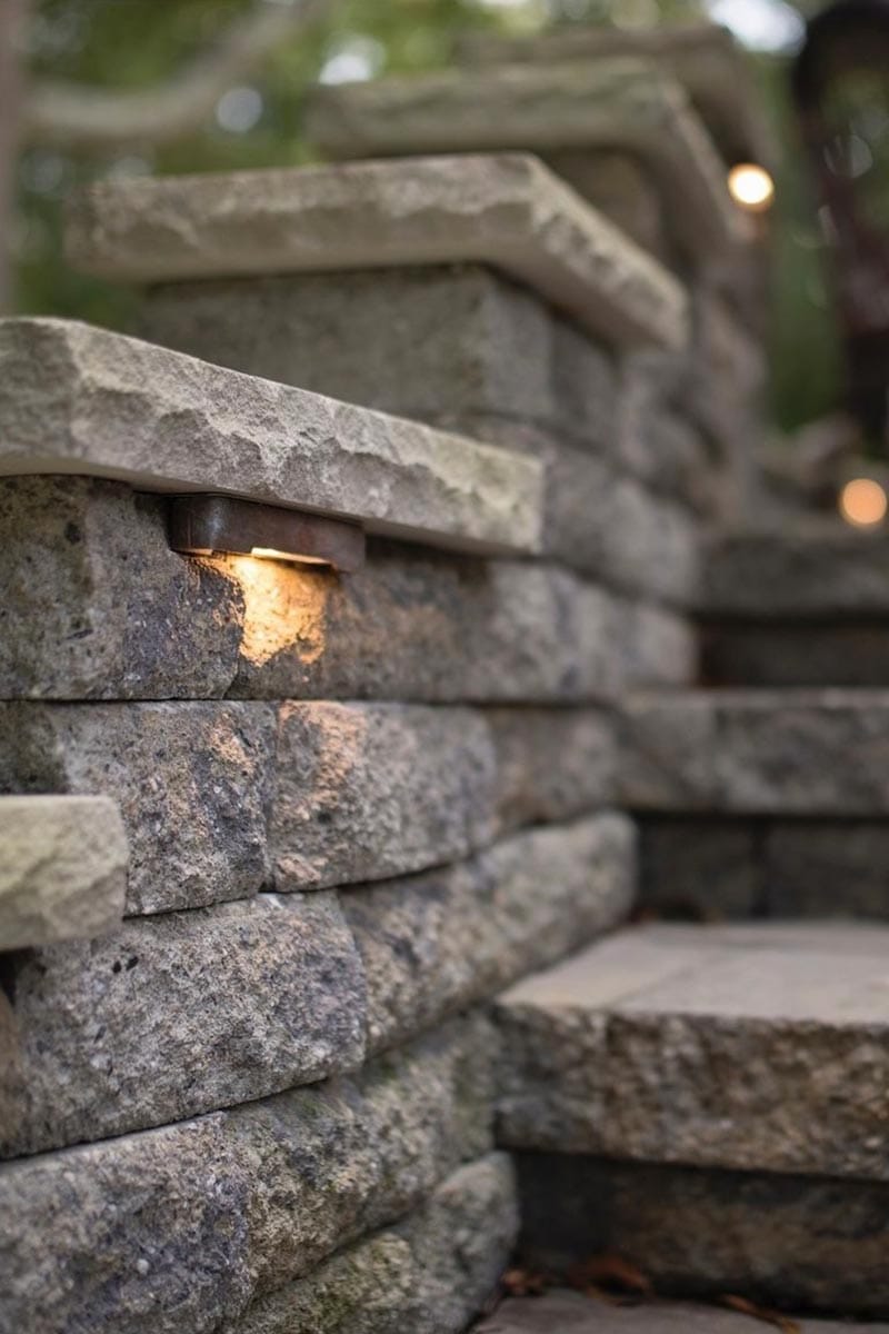 Close up of brick wall using low-voltage lighting.