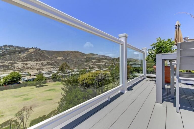 Outdoor deck with glass railing using TimberTech Terrain Collection deck.