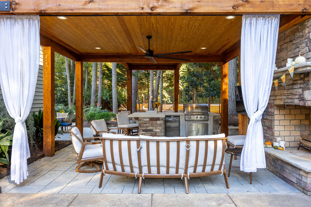 Direct front facing view of underneath Trenton Woods pavilion with the fire place on the right.