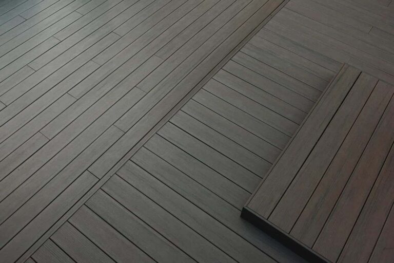 Close up of a deck using Legacy Collection Espresso composite deck from TimberTech.