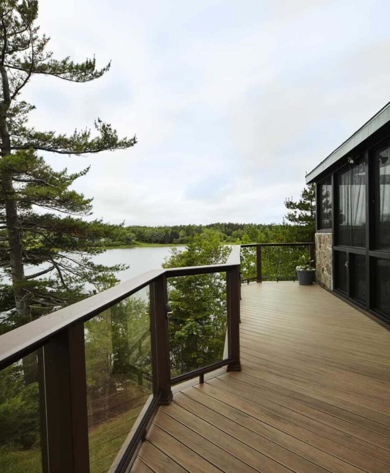 Deck facing lake, featuring Legacy Collection composite deck by TimberTech.