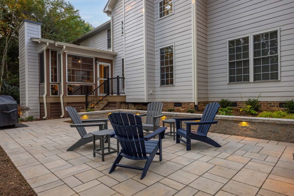 Wide shot of Banyon Tree patio showcasing TimberTec composite decking and Techo-Bloc patio pavers.