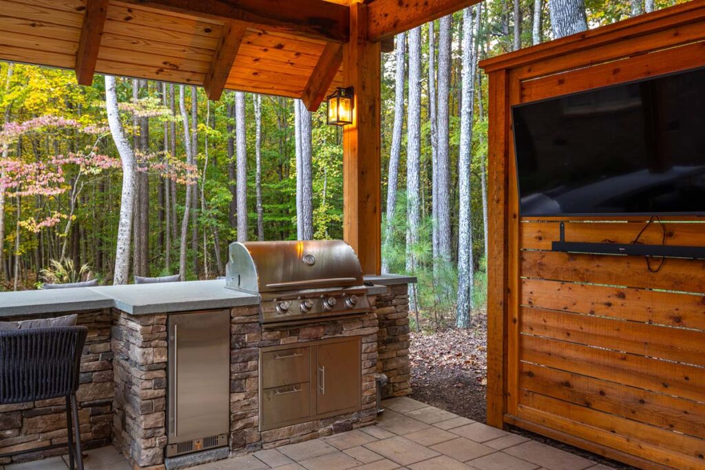 Close up of Colvard Park out door grill and television as part of the pavilion.