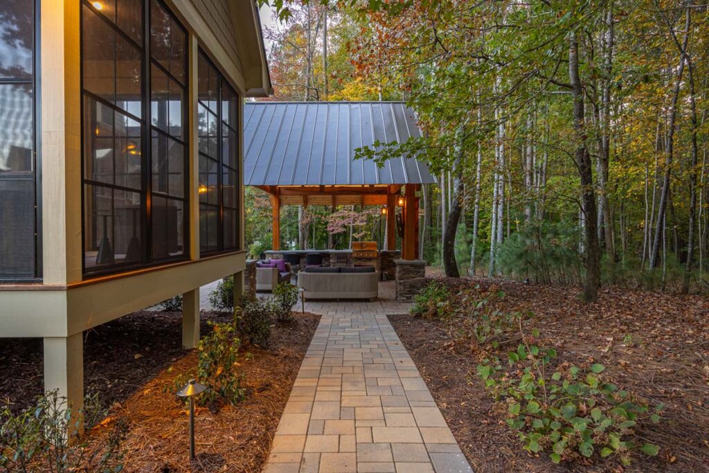 Colvard Park in the Evening with walkway leading to the pavilion with composite decking the right.