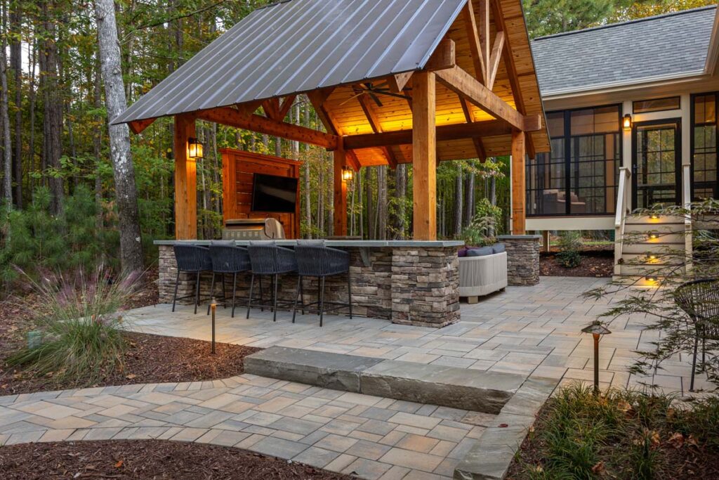 Corner view of Colvard Park pavilion showing Techo-Bloc pavers and composite deck in the background.