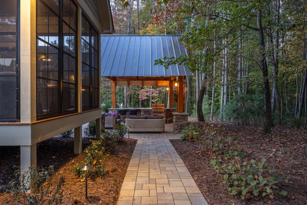 Colvard Park in the Evening with walkway leading to the pavilion with composite decking the right.