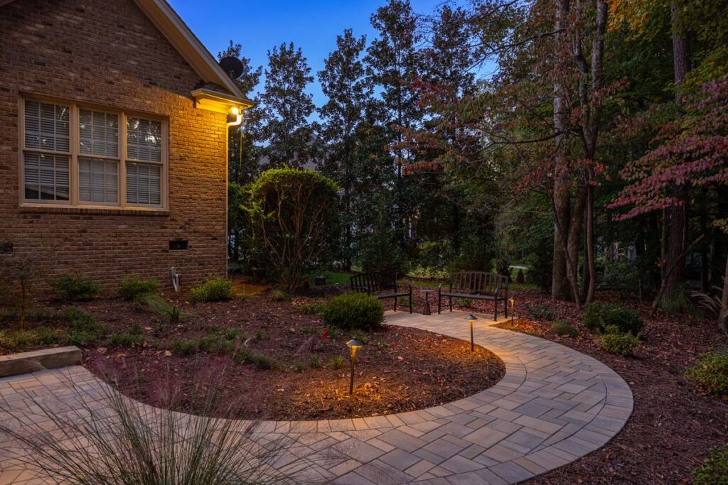 Evening shot of Colvard Park semicircle walkway with low-voltage lighting.