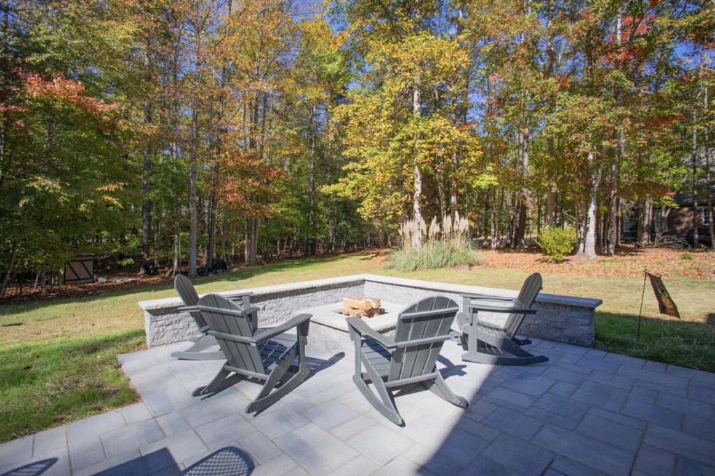 Closer view of Northlake featuring fire pit surrounded by four patio chairs.