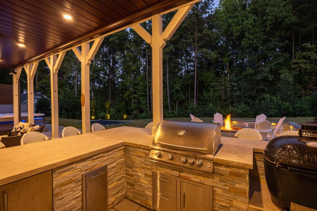 Three-quarter view of Roseroot from outdoor kitchen facing towards patio.