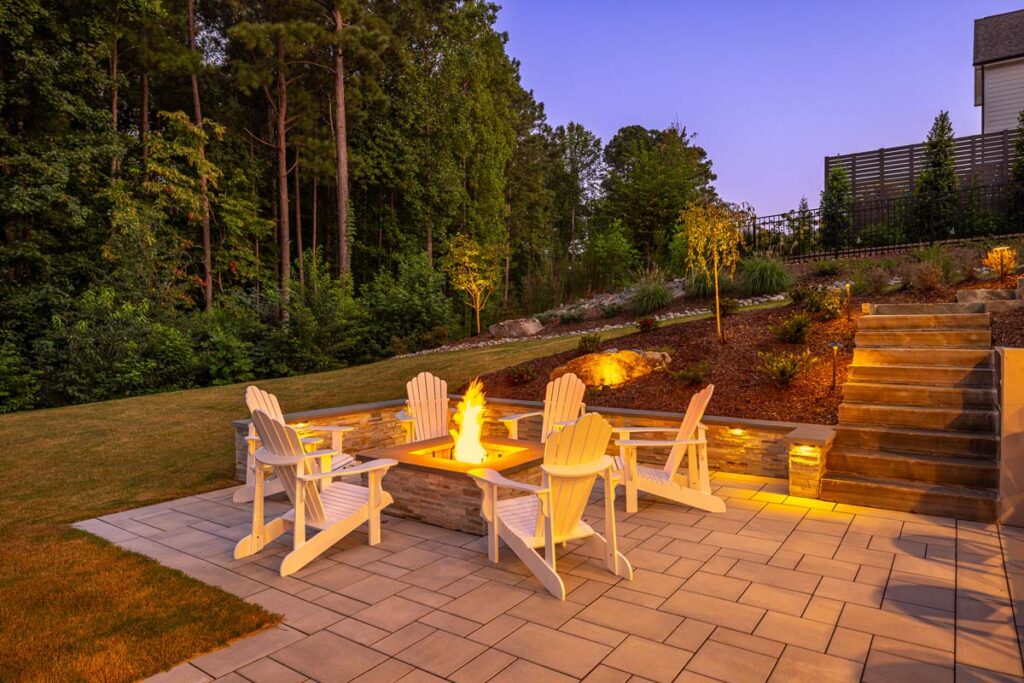 Roseroot steps leading towards deck, with evening scene highlighting low-voltage lighting.