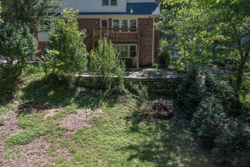 Wide shot of initial retaining wall and wooden deck of Rushing Brook.