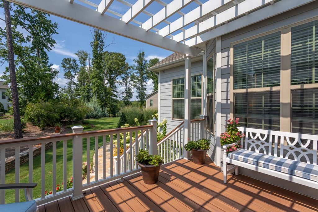 Wide corner view of Silver deck view walkway, showing composite decking from TimberTech, and pergola top.