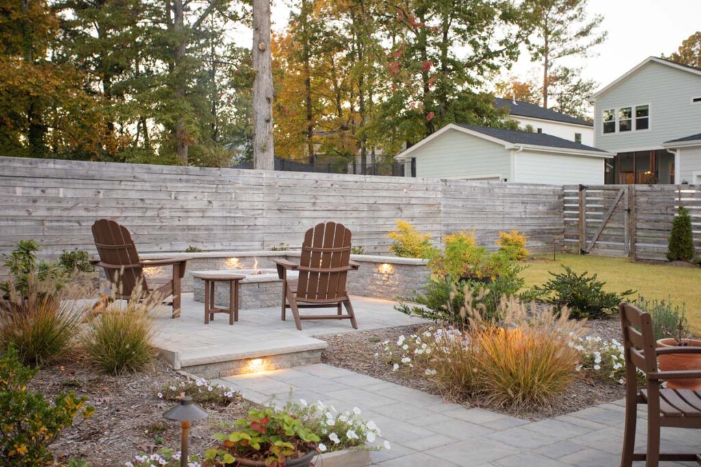 Wide shot of Steven patio project featuring, Techo-bloc pavers and fire pit.