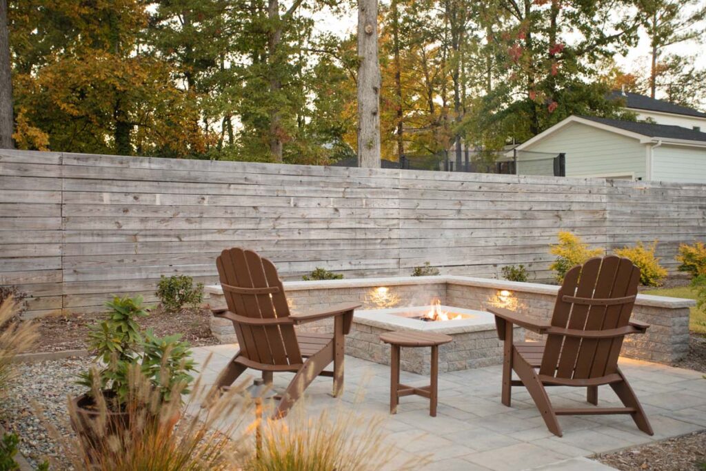 Wide shot of Steven patio project featuring, Techo-bloc pavers and fire pit.