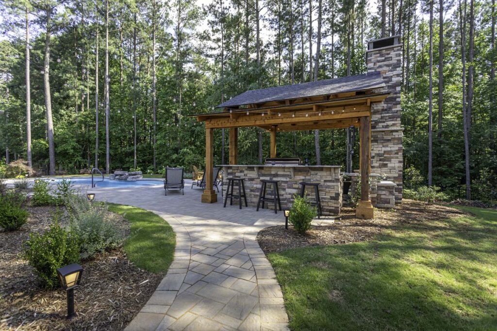 Back view of Swann Trail project featuring custom-built pavilion, and pool.