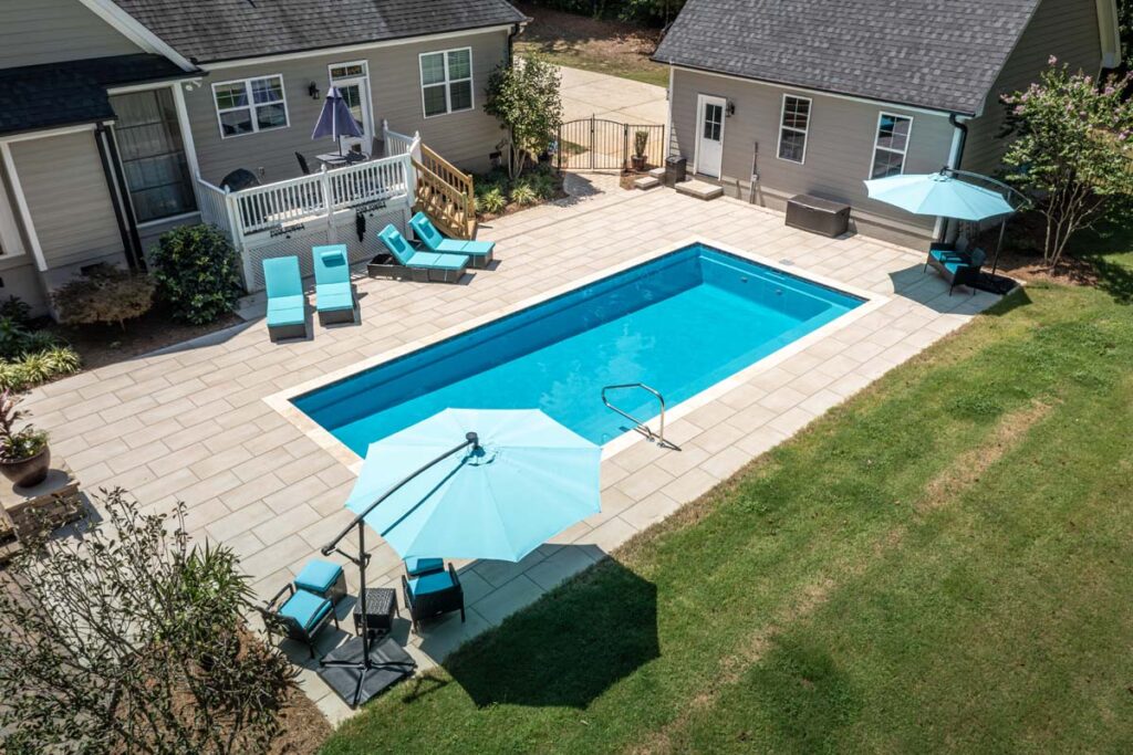 Aerial shot of Vision custom pool with Techo-Bloc patio pavers.