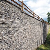 Diamond Pro Wall with wooden fence on top.